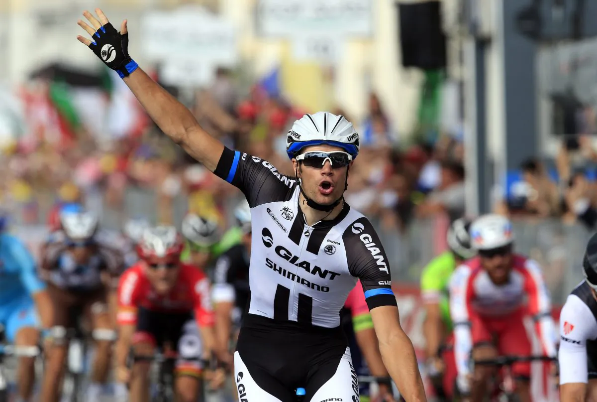Luka Mezgec reacts as he crosses the finish line to win Stage 21 of the 97th Giro d'Italia cycling race, 172km from Gemona to Trieste, on June 1, 2014. (Luk Benies/AFP/Getty Images)