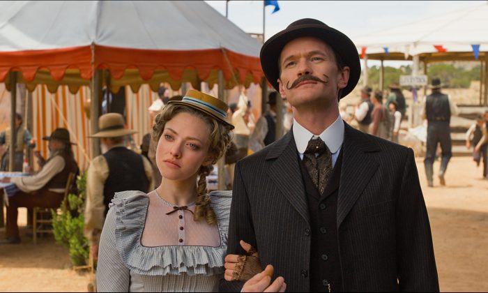 Amanda Seyfried and Neil Patrick Harris as Louise and Foy. (Universal Pictures)