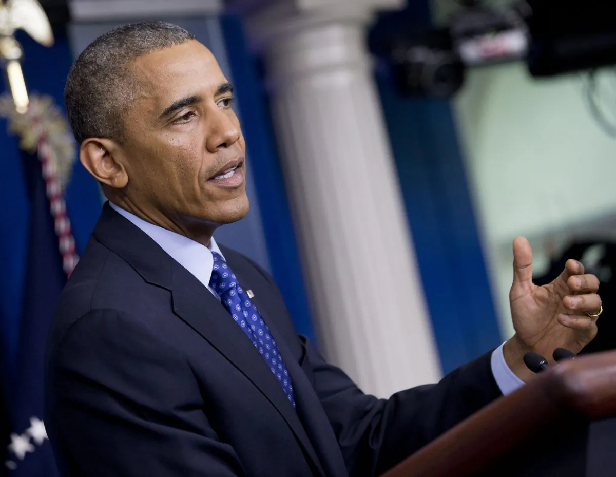 President Barack Obama speaks about the situation in Iraq, Thursday, June 19, 2014, in the Brady Press Briefing Room of the White House in Washington. Obama said the US will send up to 300 military advisers to Iraq, set up joint operation centers. (AP Photo/Jacquelyn Martin)
