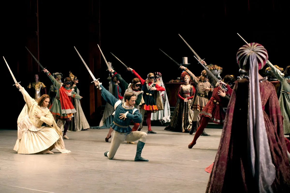 Patrick Lavoie (L) and Etienne Lavigne (R) perform with artists of the National Ballet of Canada in Alexei Ratmansky’s Romeo and Juliet, 2013. (Daniel Neuhaus, courtesy National Ballet of Canada)