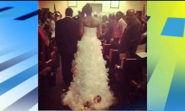 Bride Attaches Her Baby to Wedding Dress (Video)