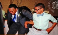 Father and Son Battle in Epic Wedding Dance-Off (Video)