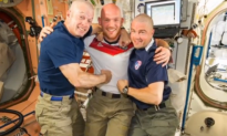 U.S. Astronauts Shave Heads After World Cup Loss (Video)