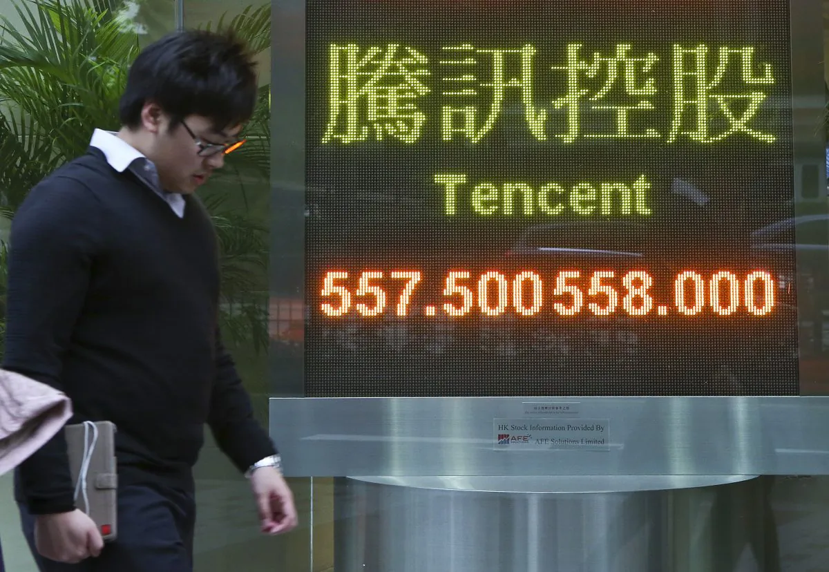 Internet company Tencent Holdings Limited: Shares fell back by 0.69 per cent at end of trading on June 12, 2014 due to false news. (Epoch Times) 