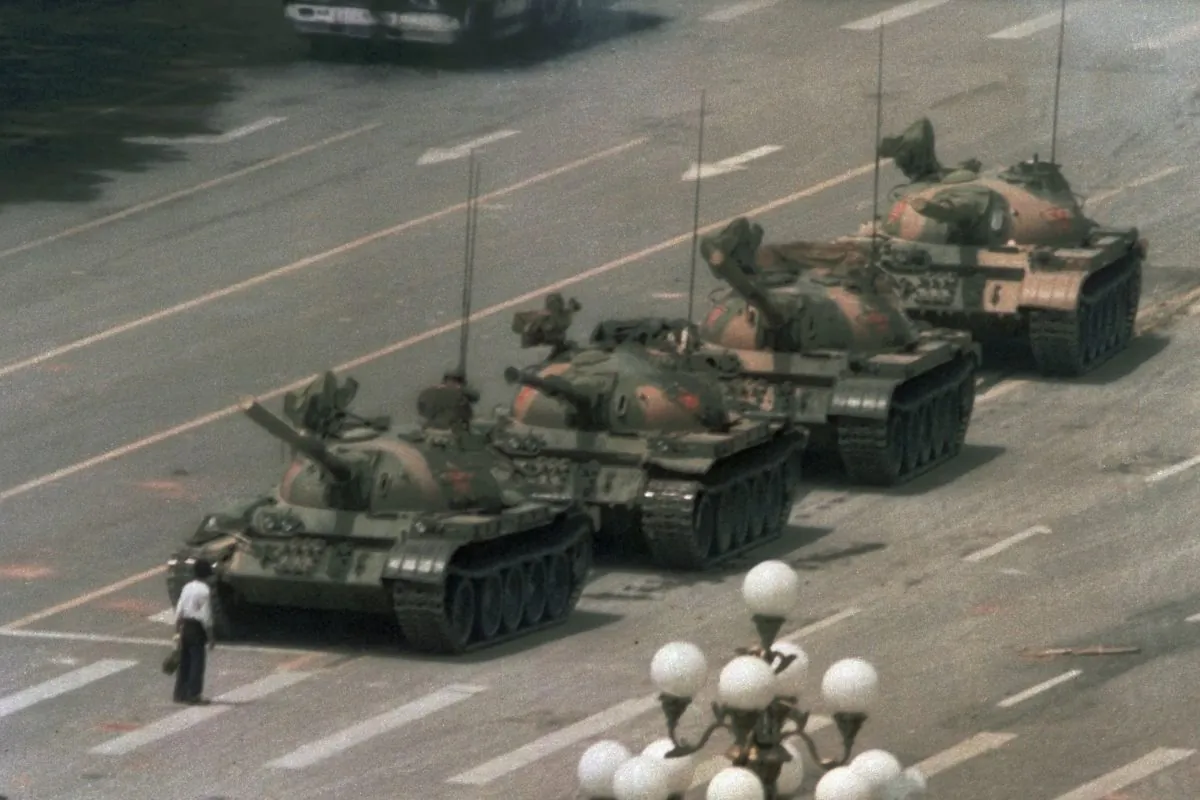 This image is how most of the world remembers  the Tiananmen Square Massacre that is now entering its 27th year anniversary. The Chinese regime has been trying to have people forget about it by censoring  discussions and having 1989 banned from textbooks and Chinese websites. (AP Photo/Jeff Widener)