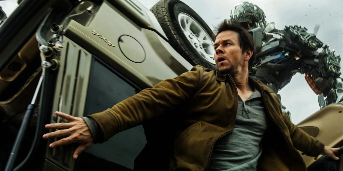 Cade Yeager (Mark Wahlberg) is chased by Autobot Lockdown in "Transformers: Age of Extinction." (Paramount Pictures)
