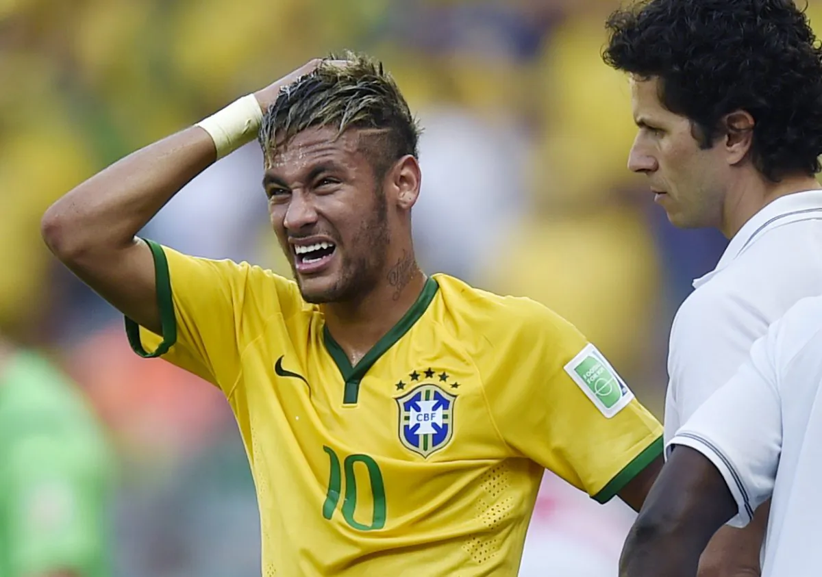 Brazil's Neymar reacts during the World Cup round of 16 soccer match between Brazil and Chile at the Mineirao Stadium in Belo Horizonte, Brazil, Saturday, June 28, 2014. (AP Photo/Martin Meissner)