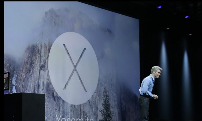 Apple senior vice president of Software Engineering Craig Federighi introduces the Yosemite operating system during the Apple Worldwide Developers Conference in San Francisco, Monday, June 2, 2014. (AP Photo/Jeff Chiu)