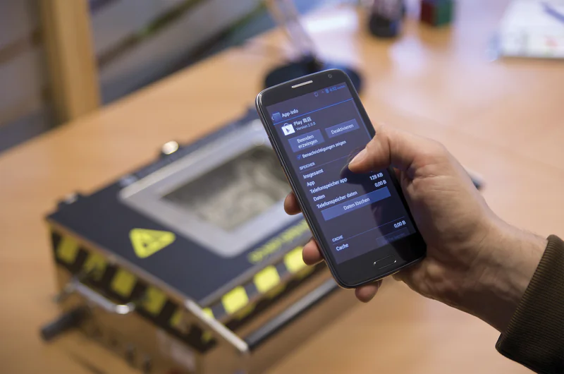 A Generic Star N9500 is analyzed by researchers in a photo from German security company G Data. The company found spying software pre-installed on the Chinese-made smartphone. (G Data)