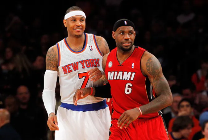 NEW YORK, NY - MARCH 03: (NEW YORK DAILIES OUT) Carmelo Anthony #7 of the New York Knicks in action against LeBron James #6 of the Miami Heat at Madison Square Garden on March 3, 2013 in New York City. The Heat defeated the Knicks 99-93. NOTE TO USER: User expressly acknowledges and agrees that, by downloading and/or using this Photograph, user is consenting to the terms and conditions of the Getty Images License Agreement. (Photo by Jim McIsaac/Getty Images)