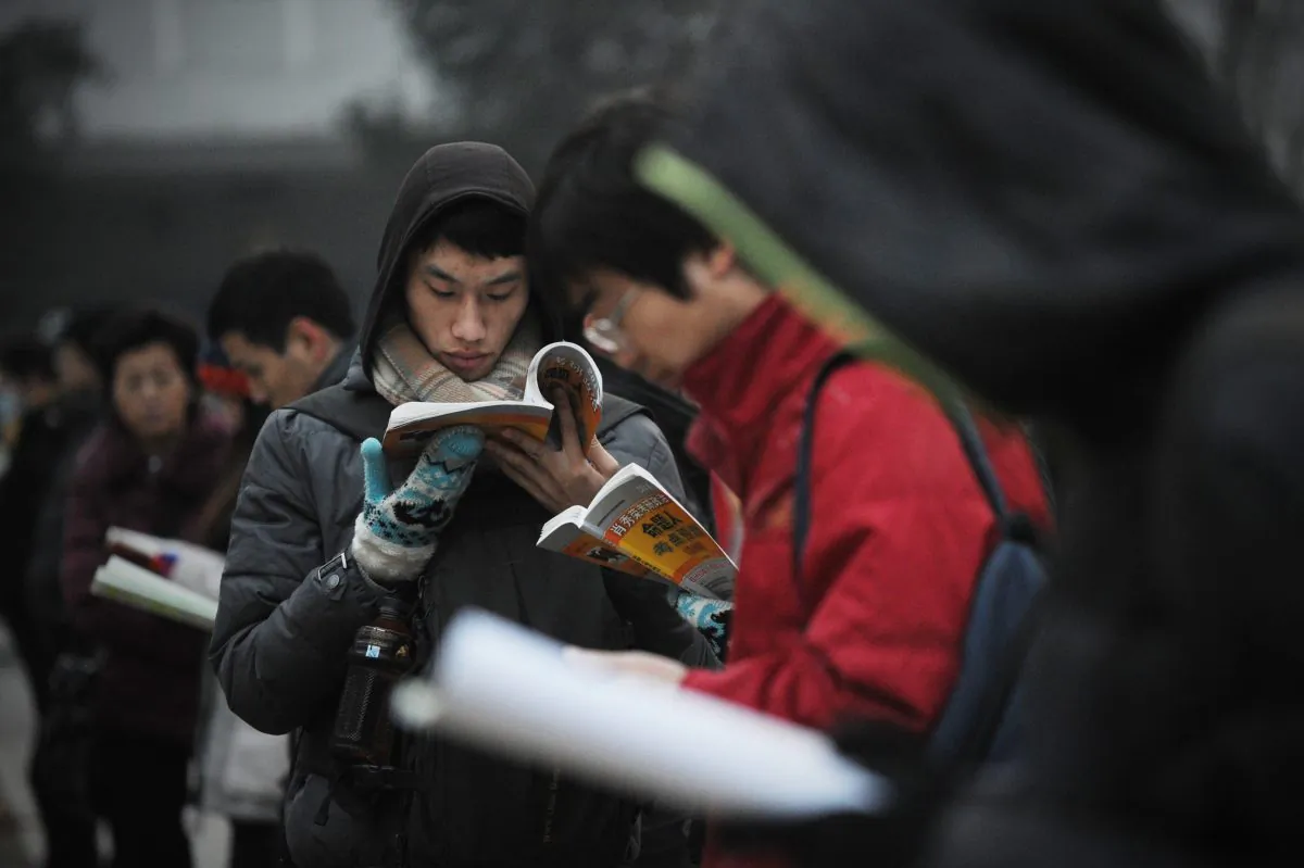 Students read at a university in Beijing on Jan. 4, 2014. A series of suicides at high schools has taken place in China, as students around the country come under the pressure of the impending Gaokao, or national exam. (Wang Zhao/AFP/Getty Images) 