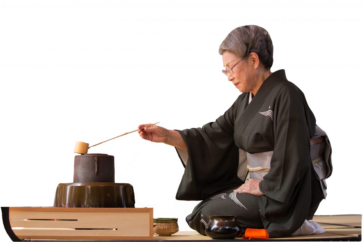 Professor Masako Koike Sohga performs a Japanese traditional tea ceremony for guests in the audience, during the opening event for Taste Asia Food and Culture Festival, in Times Square, on June 25. (Edward Dai/Epoch Times)