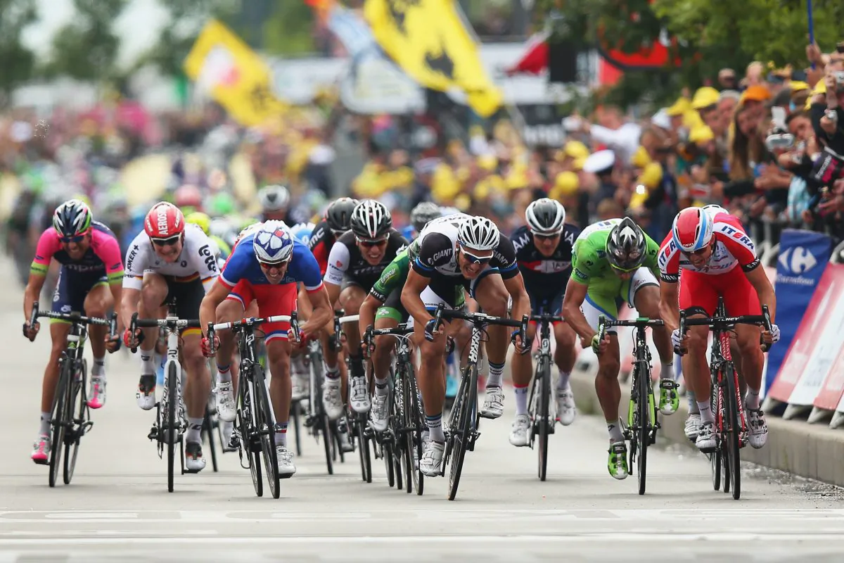 Marcel Kittel Giant-Shimano (C) sprints to win Stage Four of the 2014 Tour de France, 163 km from Le Touquet-Paris-Plage to Lille, on July 8, 2014 in Lille, France. (Bryn Lennon/Getty Images)