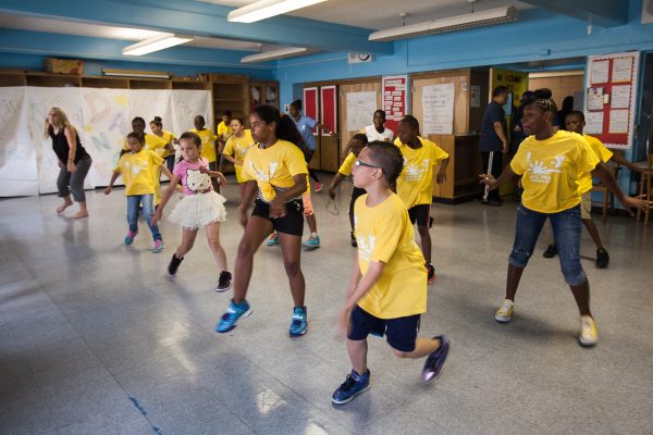 Students participate in a Summer Quest dance lesson at P.S. 154 School in the South Bronx, New York, July 15, 2014. (Petr Svab/Epoch Times)
