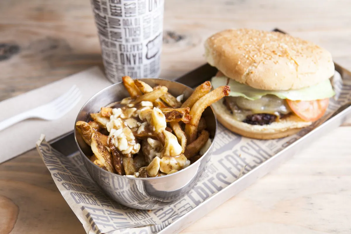 Poutine and burger. (Samira Bouaou/Epoch Times)