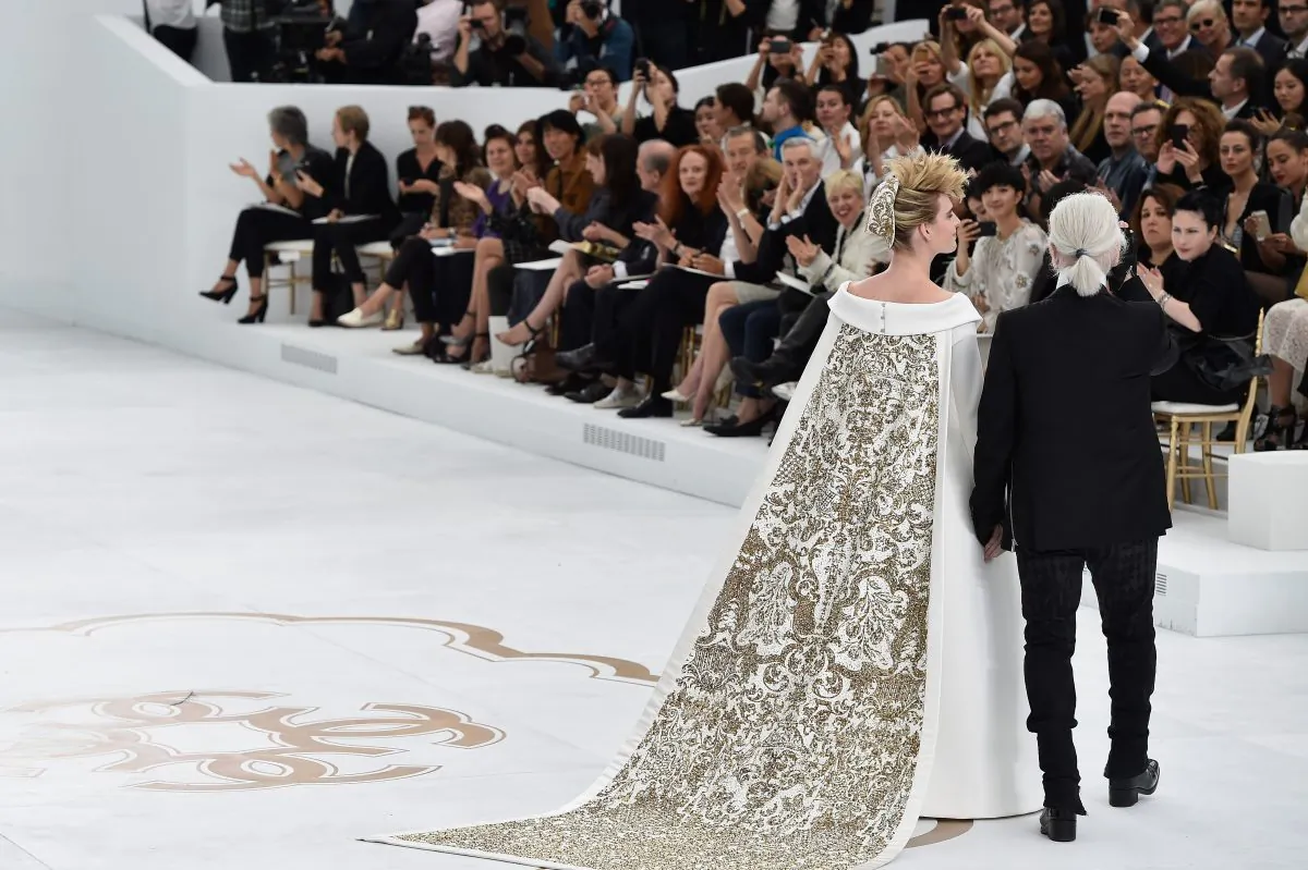 Lagerfeld with his Chanel couture Princess. (Getty Images)