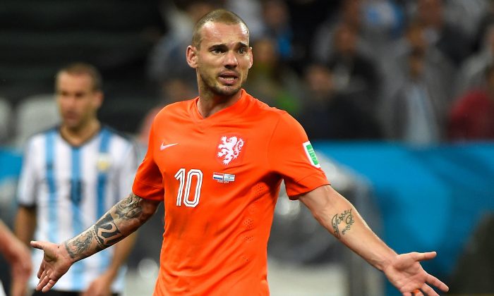 Netherlands' midfielder Wesley Sneijder reacts during the second half of extra time during the semi-final football match between Netherlands and Argentina of the FIFA World Cup at The Corinthians Arena in Sao Paulo on July 9, 2014. (ODD ANDERSEN/AFP/Getty Images)