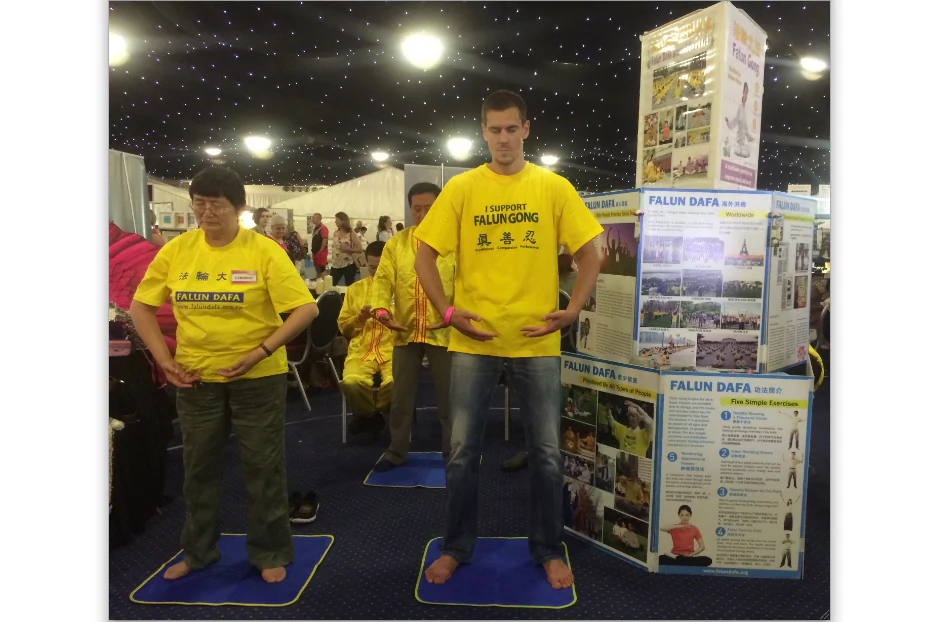 Falun Gong practitioners demonstrated the Exercises at their stand in the Health and Healing Festival in Leeds, UK, on July 12th and 13th. (Epoch Times)