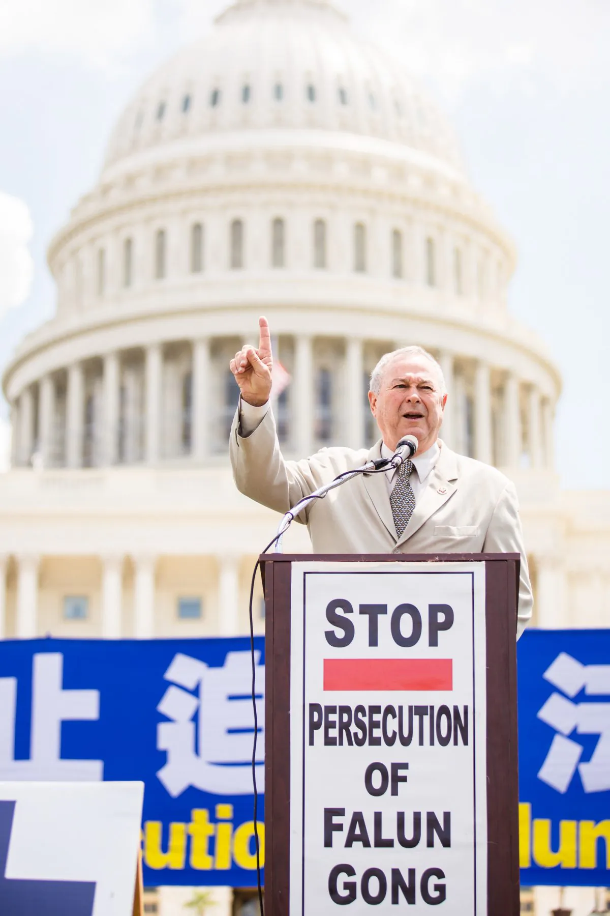 Rep. Dana Rohrabacher (R-Calif.) speaks at a rally supporting Falun Gong and pushing for congress to take action to help end the Chinese regime's persecution of the practice, at the U.S. Capitol, in Washington, on July 17, 2014. (Edward Dai/Epoch Times)