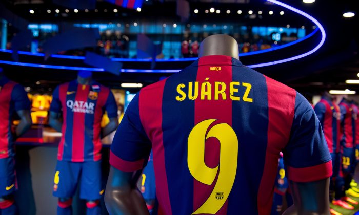 A shirt of new FC Barcelona player Luis Suarez are seen on display at the FC Barcelona official store on July 12, 2014 in Barcelona, Spain. (Photo by David Ramos/Getty Images)