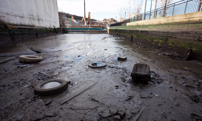 Trash and sludge are visible in the heavily polluted Gowanus Canal on Jan. 24, 2012. (Epoch Times)