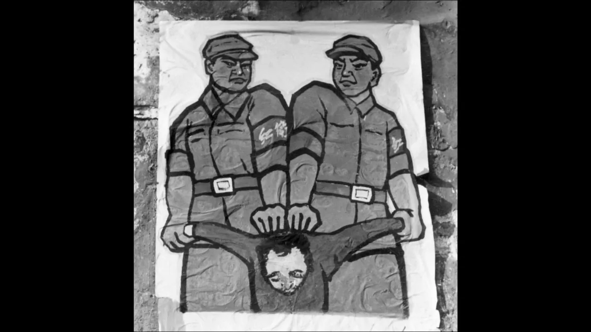 A poster is displayed in late 1966 in Beijing's street featuring how to deal with so-called 'enemy of the people' during the Great Proletarian Cultural Revolution. During the summer of 2008, an angry mob of Chinese heckles organized at the "Quit CCP" booth in Flushing, harassing and beating Falun Gong practitioners. in New York. (Jean Vincent/AFP/Getty Images)