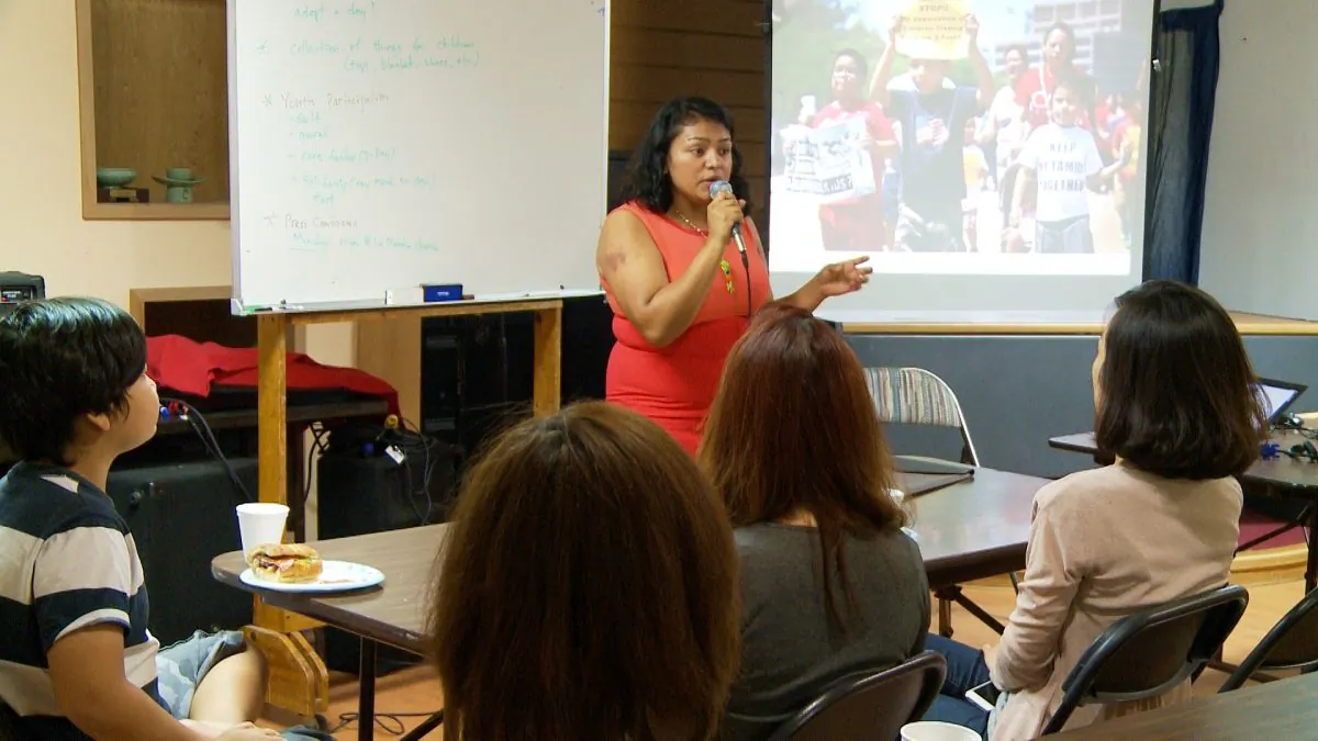 Yamilex Rustrian gives a presentation at the Korean Resource Center in Los Angeles on July 17. She is helping organize a five-day fast called Children Over Politics that began Monday, July 21. (Andrew Li/Epoch Times Staff)