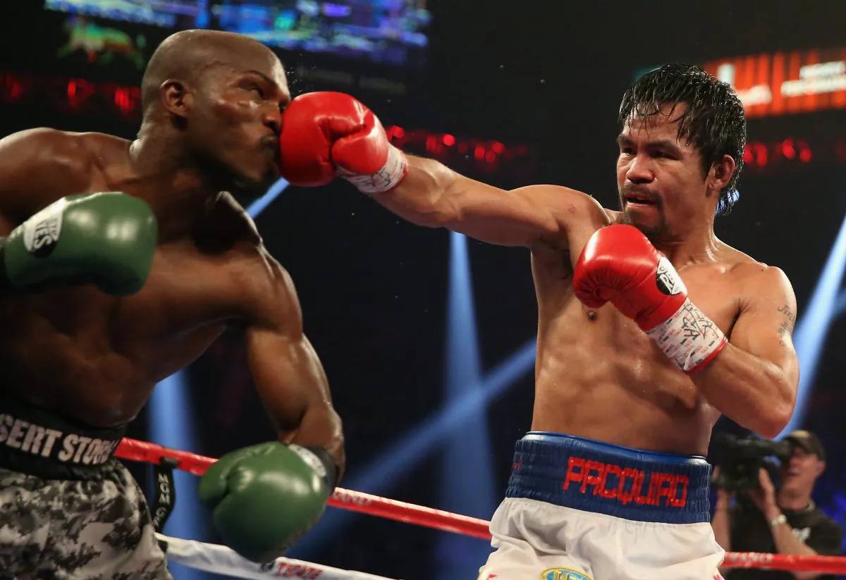 Manny Pacquiao throws a right hand at Timothy Bradley at the MGM Grand Garden Arena on April 12, 2014 in Las Vegas, Nevada. (Jeff Gross/Getty Images)