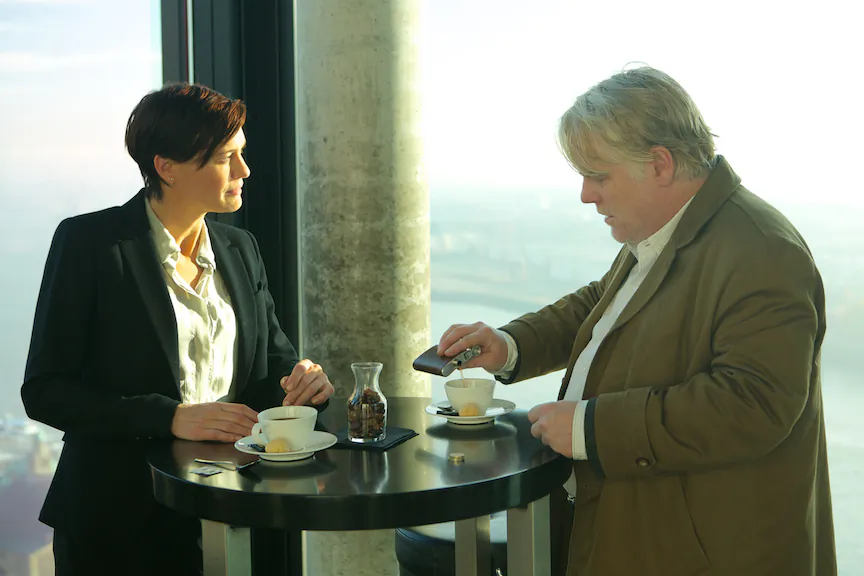 Robin Wright as a CIA agent and Philip Seymour Hoffman as a German intelligence officer in “A Most Wanted Man.” (Roadside Attractions)
