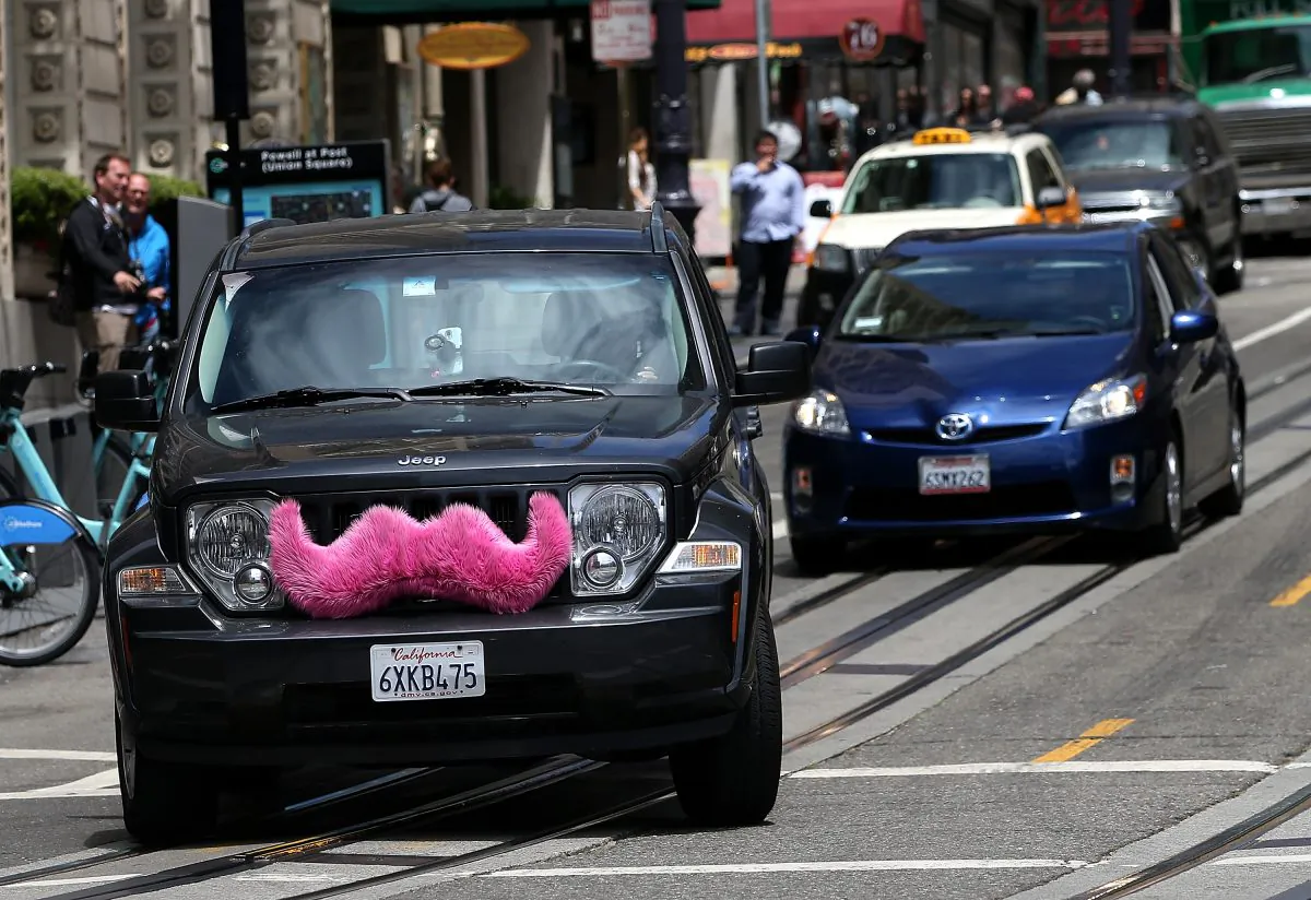 A Lyft car drives along Powell Street on June 12, 2014 in San Francisco, California. (Justin Sullivan/Getty Images)
