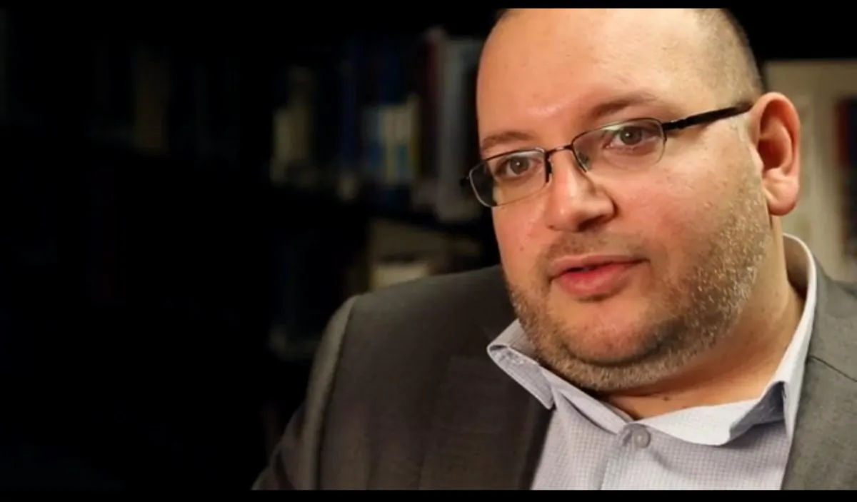 A Nov. 6, 2013, photo shows Jason Rezaian, a Washington Post reporter, at the newspaper in Washington. (AP Photo/The Washington Post, Zoeann Murphy)