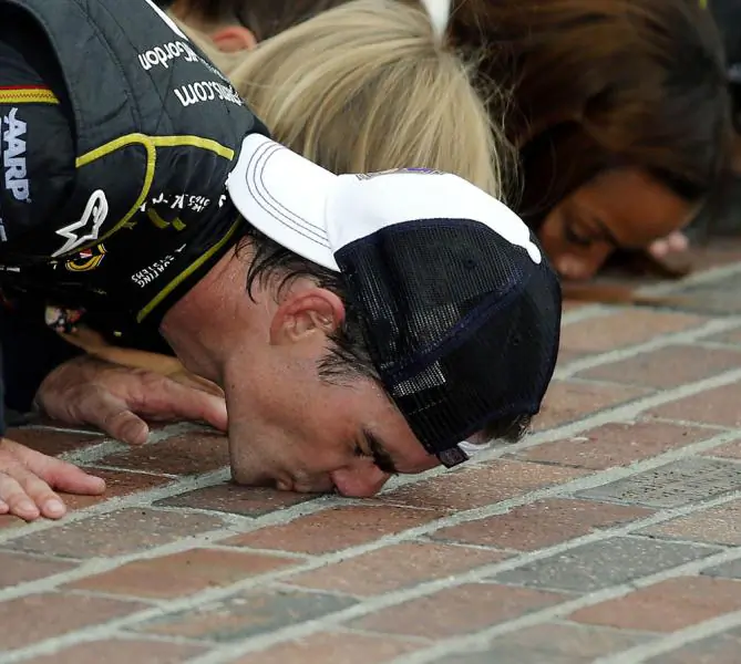 Jeff Gordon kisses the bricks at Indy.
