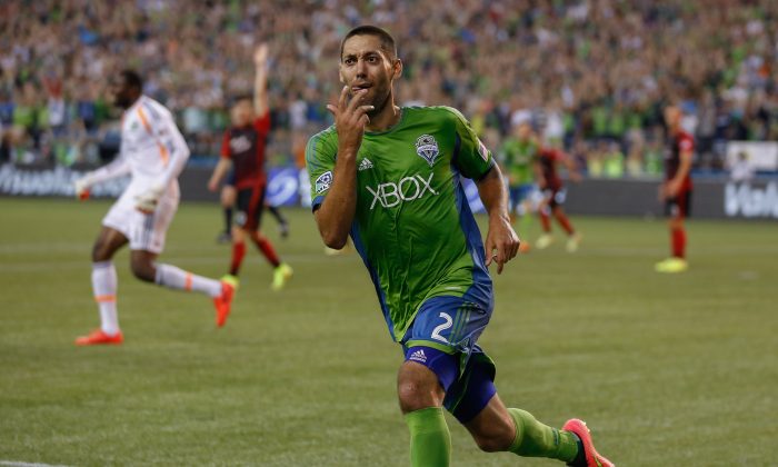 Clint Dempsey #2 of the Seattle Sounders reacts after scoring a goal in the second half against the Portland Timbers at CenturyLink Field on July 13, 2014 in Seattle, Washington. (Photo by Otto Greule Jr/Getty Images)