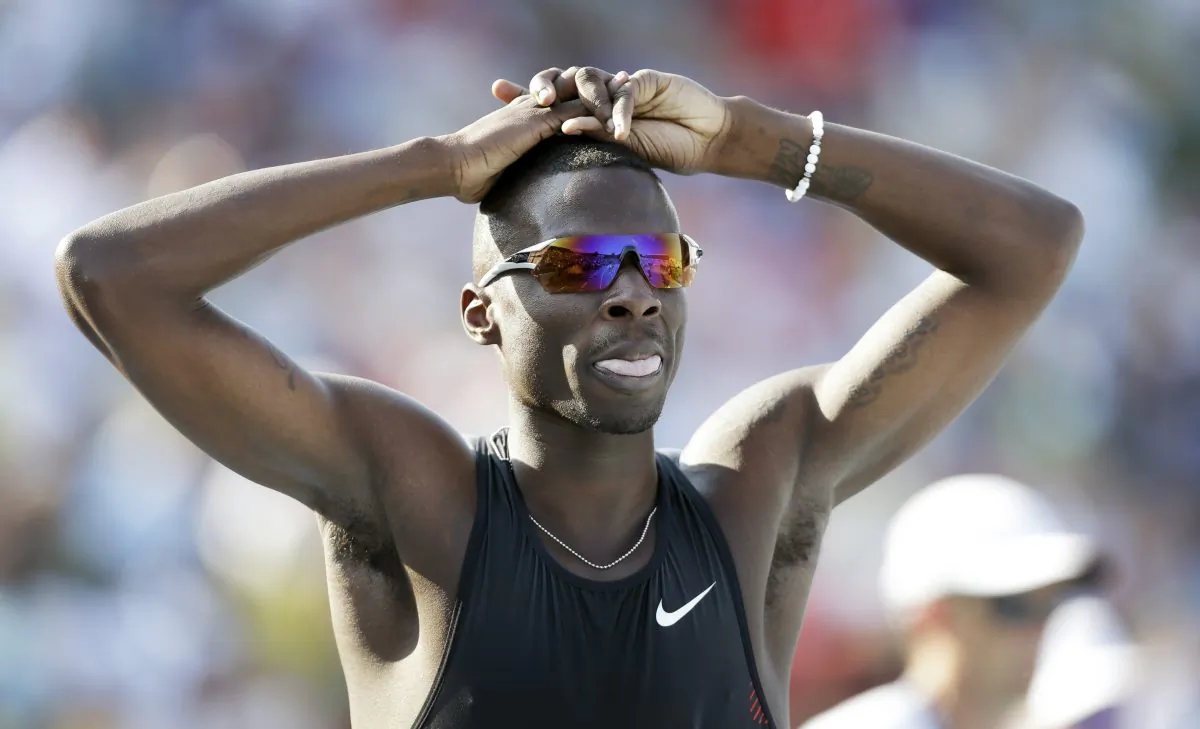 In this June 20, 2013 file photo, Torrin Lawrence reacts after his heat in the senior men's 400-meter dash at the U.S. Championships athletics meet in Des Moines, Iowa. Former University of Georgia 400-meter runner Torrin Lawrence died in a car accident early Monday, July 28, 2014 in Cordele, Ga. He was 25. (AP Photo/Charlie Neibergall, File)