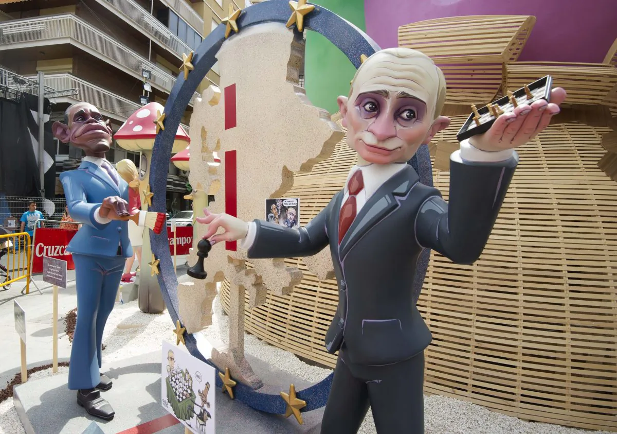Hogueras, satirical structures made of cardboard portraying current events and personalities, of Russian Prime Minister Vladimir Putin (R) and U.S. President Barack Obama in Alicante, Spain, on June 23, 2014. (Jose Jordan/AFP/Getty Images)