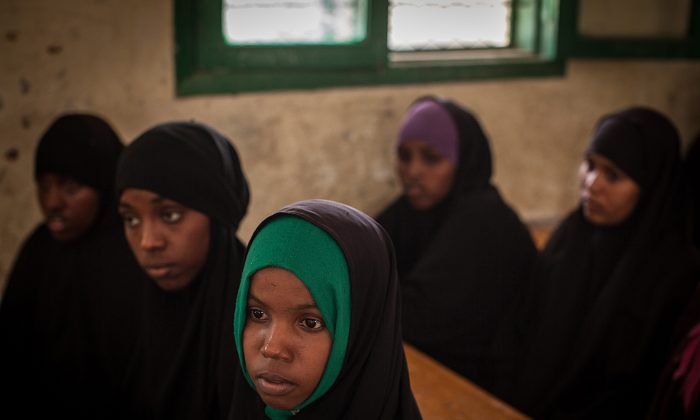 Women take part with other young women and men in a discussion on female genital mutilation (FGM) at an after school program for children's rights in northern Somalia on Feb. 19, 2014. (Nichole Sobecki/AFP/Getty Images)