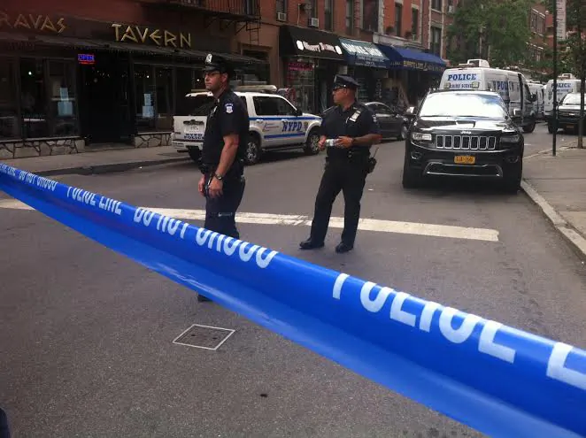 The crime scene in West Village where three law enforcement members were injured in an attempt to arrest a sex offender from California. (Genevieve Belmaker/Epoch Times)