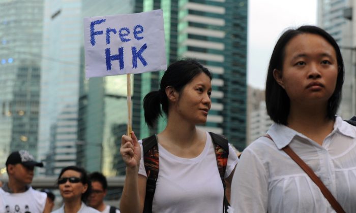 A protester during a pro-democracy rally in Hong Kong on July 1, 2014, which marked the anniversary of the handover of Hong Kong to China. (Dale de la Rey/AFP/Getty Images)
