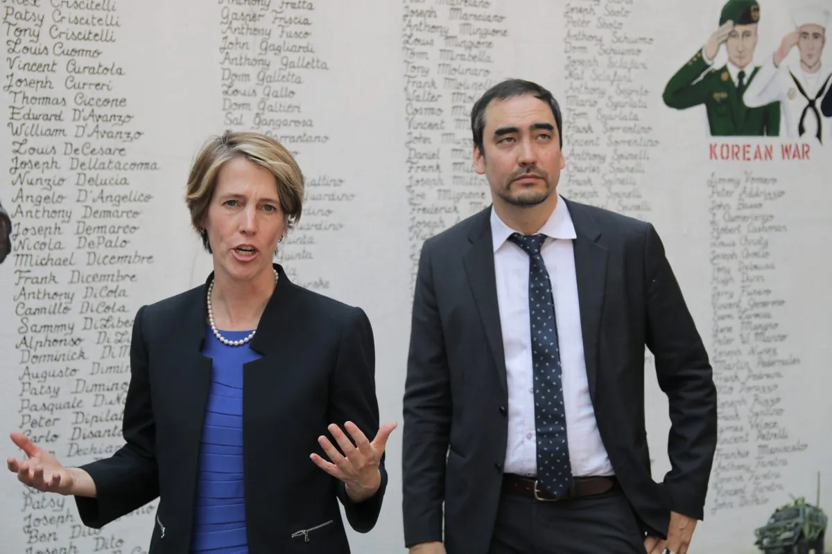 Zephyr Teachout, who's running to unseat Gov. Cuomo in the Democratic gubernatorial primary, with her running mate Tim Wu in Little Italy, New York, on July 22, 2014. (Allen Xie/Epoch Times)