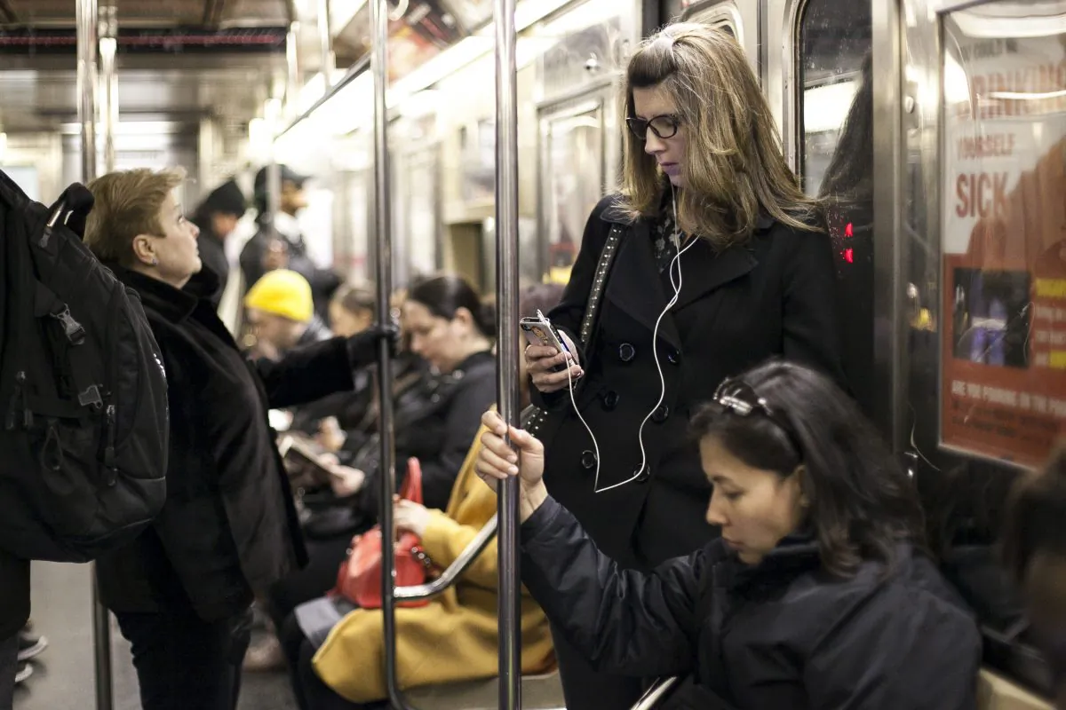 Subway riders in New York City, April 1, 2014. (Samira Bouaou/Epoch Times)