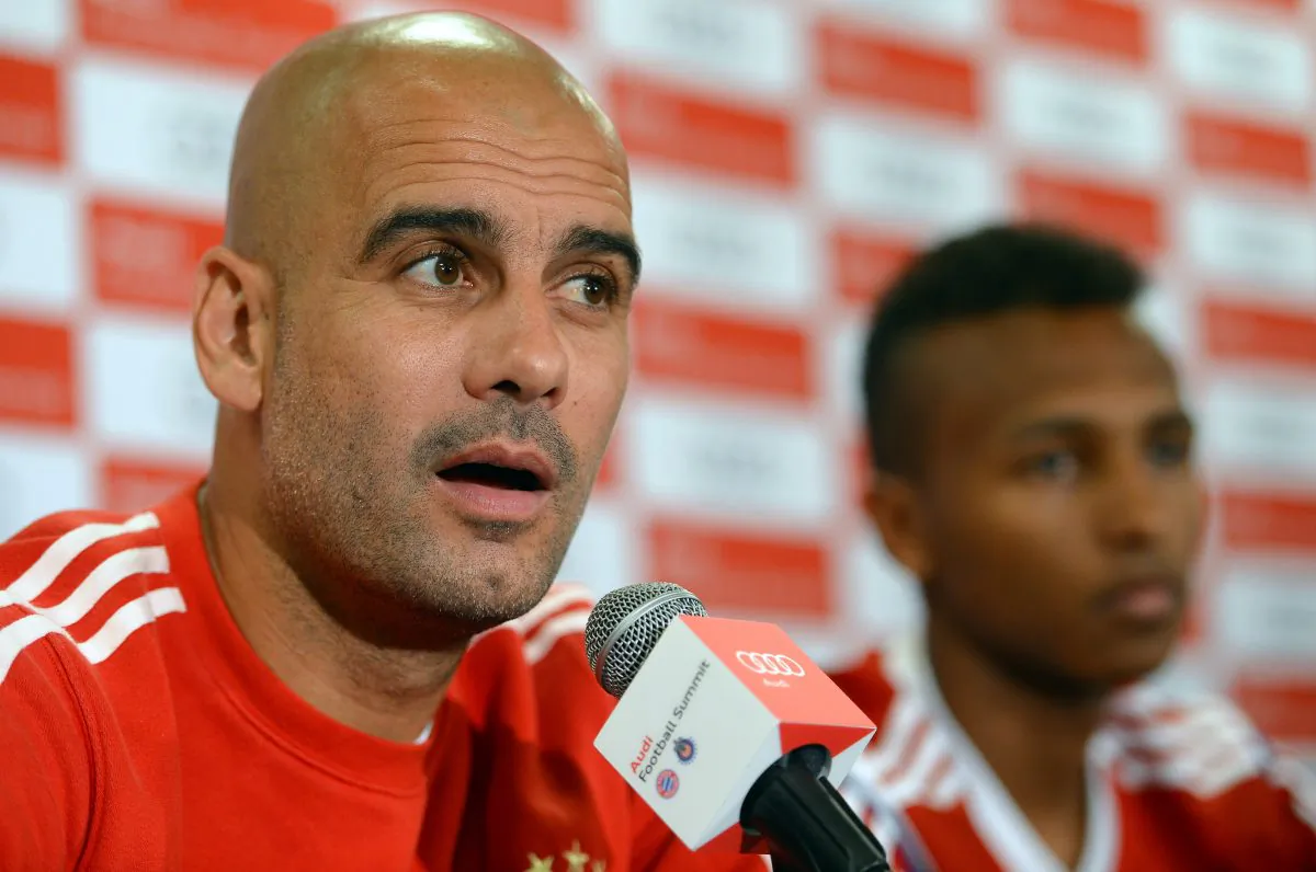 Head coach Josep Guardiola looks on during a press conference at day one of the Audi Summer Tour 2014 at Red Bull Arena on July 30, 2014 in New Jersey, United States. (Photo by Lars Baron/Bongarts/Getty Images)