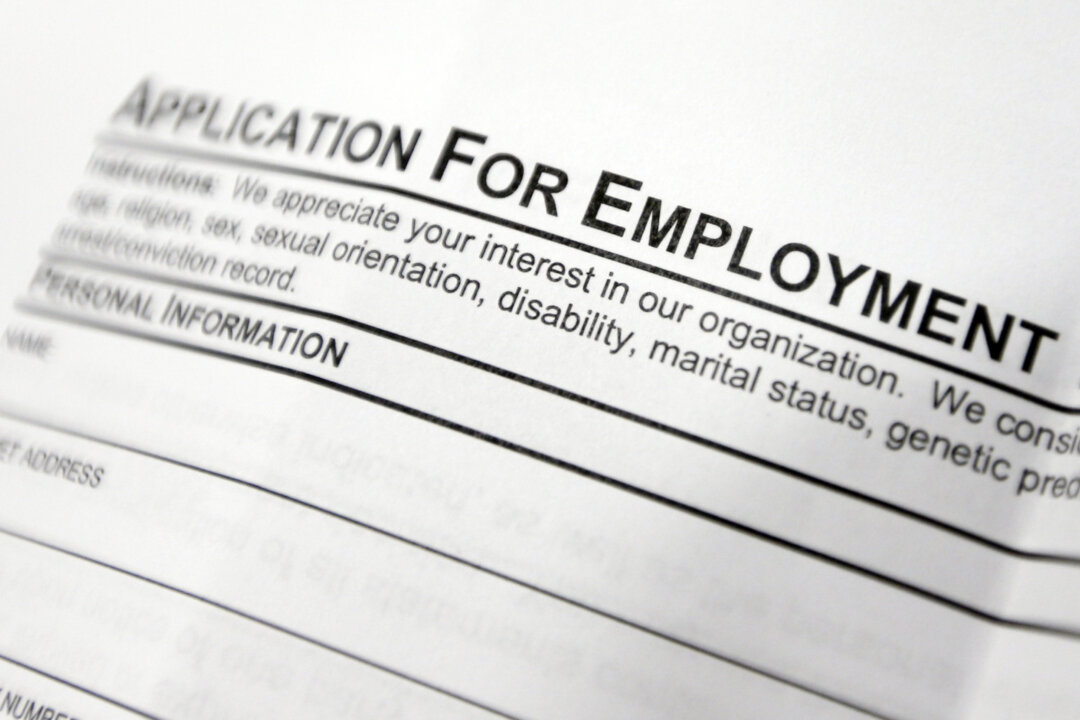 An employment application form on a table during a job fair at Columbia-Greene Community College in Hudson, N.Y., on April 22, 2014. (AP Photo/Mike Groll)