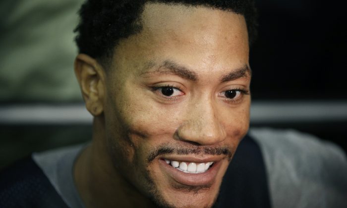 The Chicago Bulls' Derrick Rose speaks with the media after a USA Basketball minicamp practice Monday, July 28, 2014, in Las Vegas. (AP Photo/John Locher)