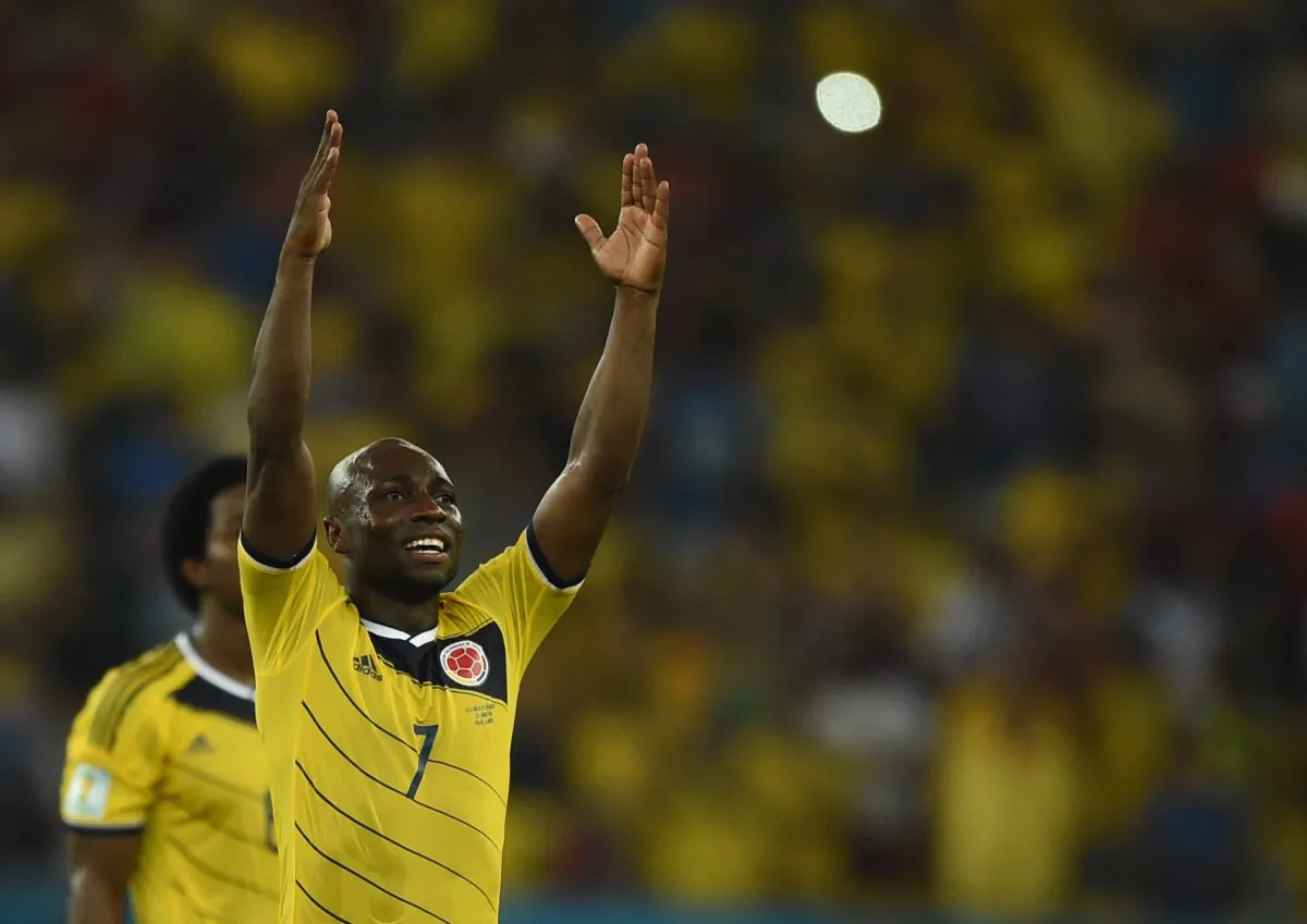 Colombia's defender Pablo Armero and his teammates celebrate after the Round of 16 football match between Colombia and Uruguay at the Maracana Stadium in Rio de Janeiro during the 2014 FIFA World Cup in Brazil on June 28, 2014. (EITAN ABRAMOVICH/AFP/Getty Images)