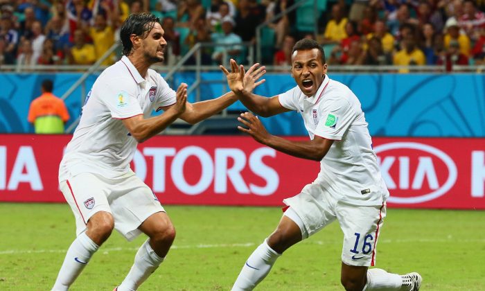 Julian Green of the United States (R) celebrates scoring his team's first goal in extra time with Chris Wondolowski during the 2014 FIFA World Cup Brazil Round of 16 match between Belgium and the United States at Arena Fonte Nova on July 1, 2014 in Salvador, Brazil. (Kevin C. Cox/Getty Images)