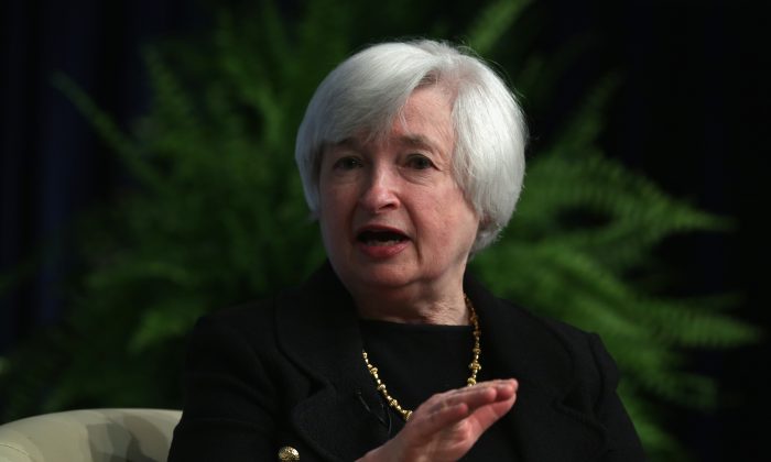 Federal Reserve Board Chairwoman Janet Yellen participates in a discussion at the International Monetary Fund (IMF) July 2, 2014, in Washington, D.C. Yellen testifies July 15 and 16 before the U.S. Congress about the health of the U.S. economy. (Alex Wong/Getty Images)