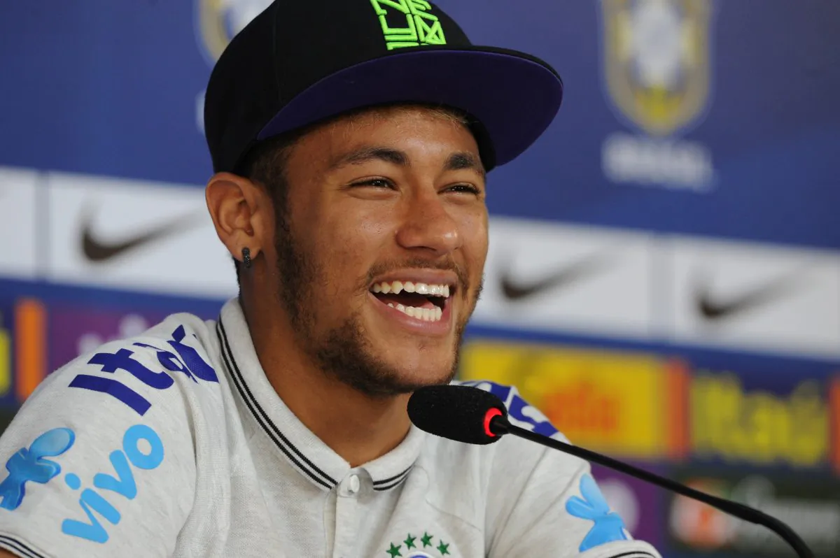 Brazil's Neymar smiles during a press conference in Teresopolis, Rio de Janeiro state, Brazil on July 2, 2014. (TASSO MARCELO/AFP/Getty Images)