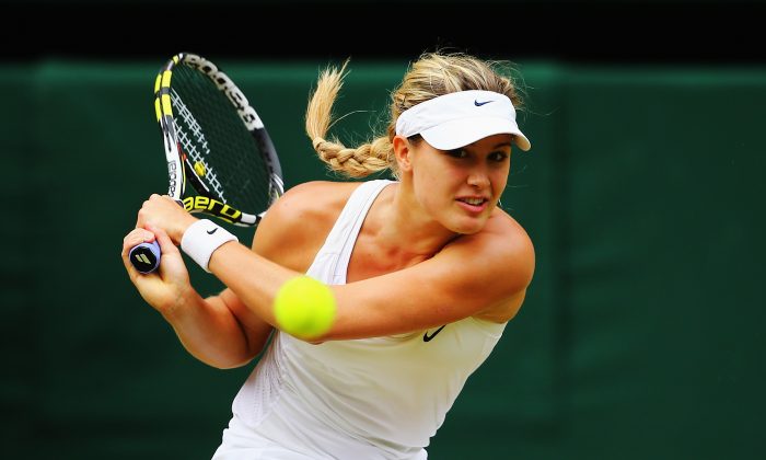 Eugenie Bouchard of Canada plays a backhand return during the Ladies' Singles final match against Petra Kvitova of Czech Republic on day twelve of the Wimbledon Lawn Tennis Championships at the All England Lawn Tennis and Croquet Club on July 5, 2014 in London, England. (Al Bello/Getty Images)