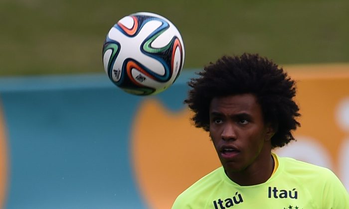 Brazil's forward Willian controls the ball during a training session at the Granja Comary training complex in Teresopolis on July 6, 2014 during the 2014 FIFA World Cup in Brazil. (VANDERLEI ALMEIDA/AFP/Getty Images)