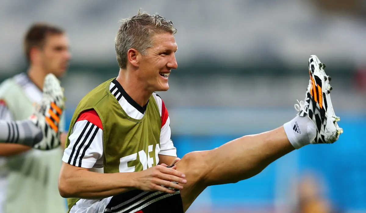 Bastian Schweinsteiger of Germany stretches during the German national team training at Estadio Mineirao on July 7, 2014 in Belo Horizonte, Brazil. (Martin Rose/Getty Images)